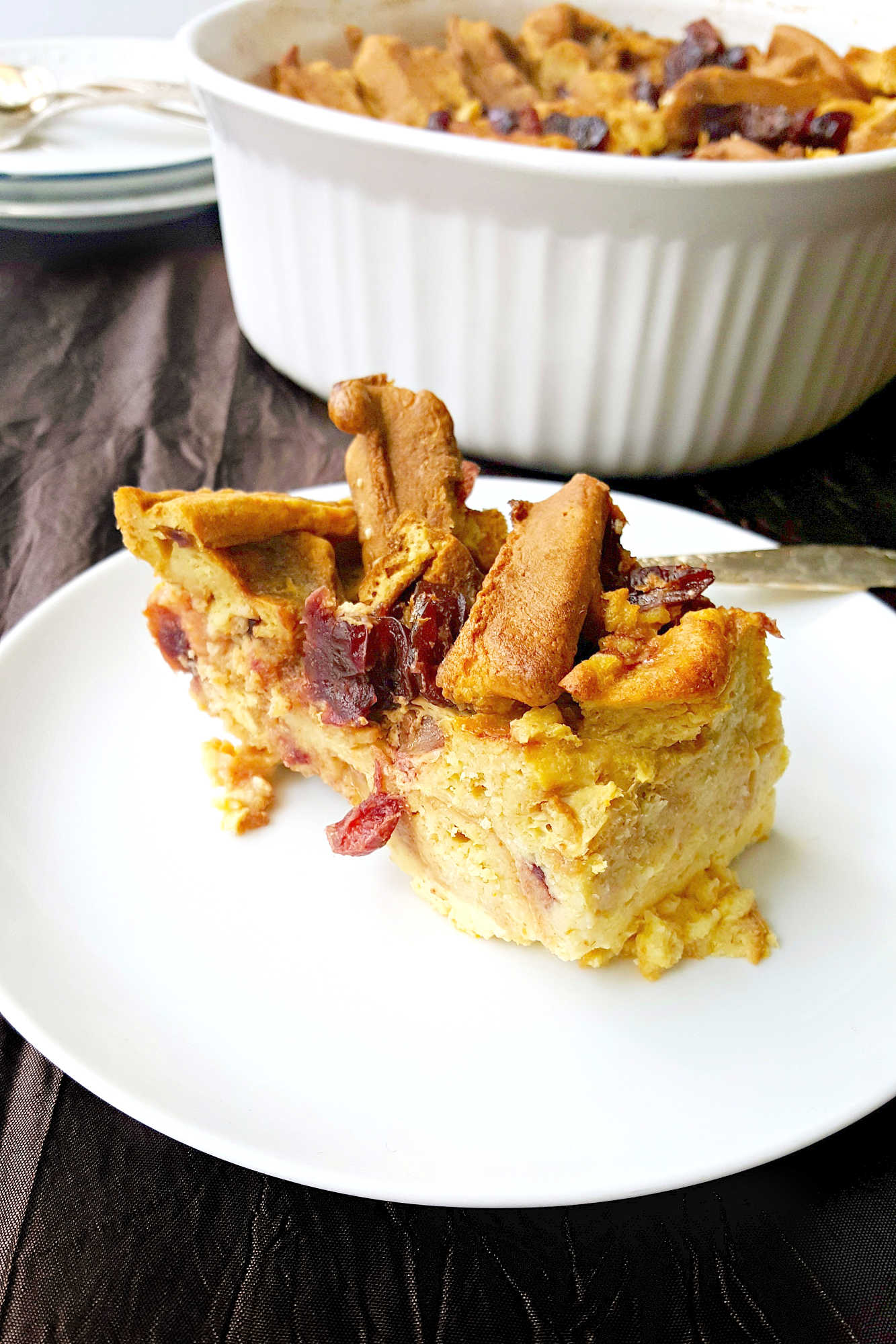 Indulge in the ultimate comfort dessert with our Orange Craisin Waffle Bread Pudding. Each bite is like a warm hug for your taste buds.  #holidaytreat #easyrecipe #CranberryCravings #BreakfastDessert #HolidaySweets #BakerySpecialties #BreadPuddingDelights #DessertObsession #BreadPuddingLove #SweetToothSatisfied #WafflePuddingPerfection #CraisinCraze #BreadPuddingHeaven #dessertupgrade #treatyourself #wafflecrush
