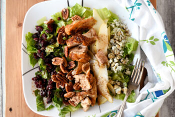 Autumn Cobb Salad has all the fall flavors. From sweet and crisp pears to crunchy pecans, and sweet tart dried cranberries. It’s a hearty and delicious fall cobb salad.  #FallFlavors #cobbsalad #pears #USAPears