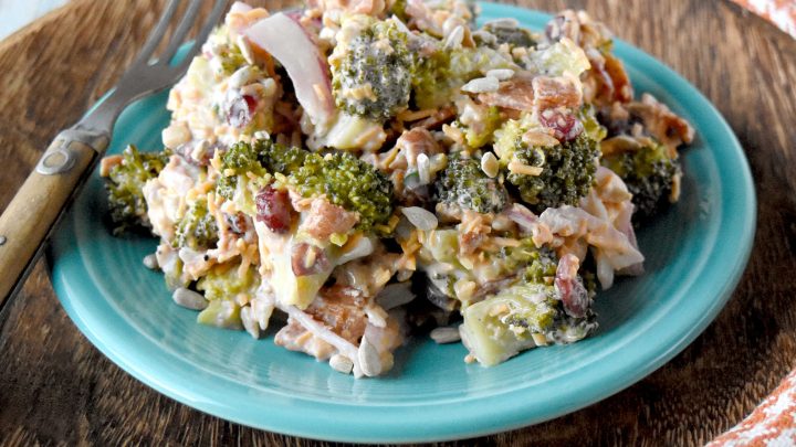 Skip the boring side salads and try this Creamy Broccoli Salad instead! Bursting with flavor and nutrients, it's the perfect accompaniment to any holiday meal. #healthyeating #creamysalad #cleaneating #broccolisalad #SaladLoversUnite #VeggieDelight  #EatYourGreens #holidaysidedish #sidedishrecipe #sidesalad