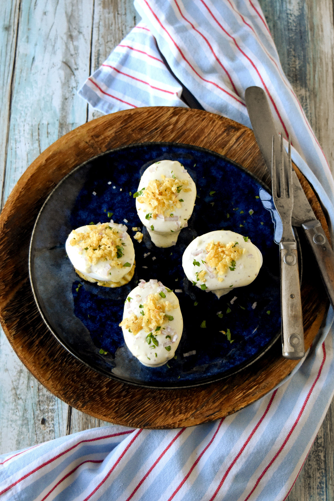 Oeufs Mayonnaise: the perfect balance of rich, creamy mayo and perfectly cooked eggs. A match made in gastronomic heaven.  #FrenchCuisine #ClassicEggDish #FoodieFaves #MayonnaiseObsessed #EggRecipes #OurFamilyTable #JacquesPepin
