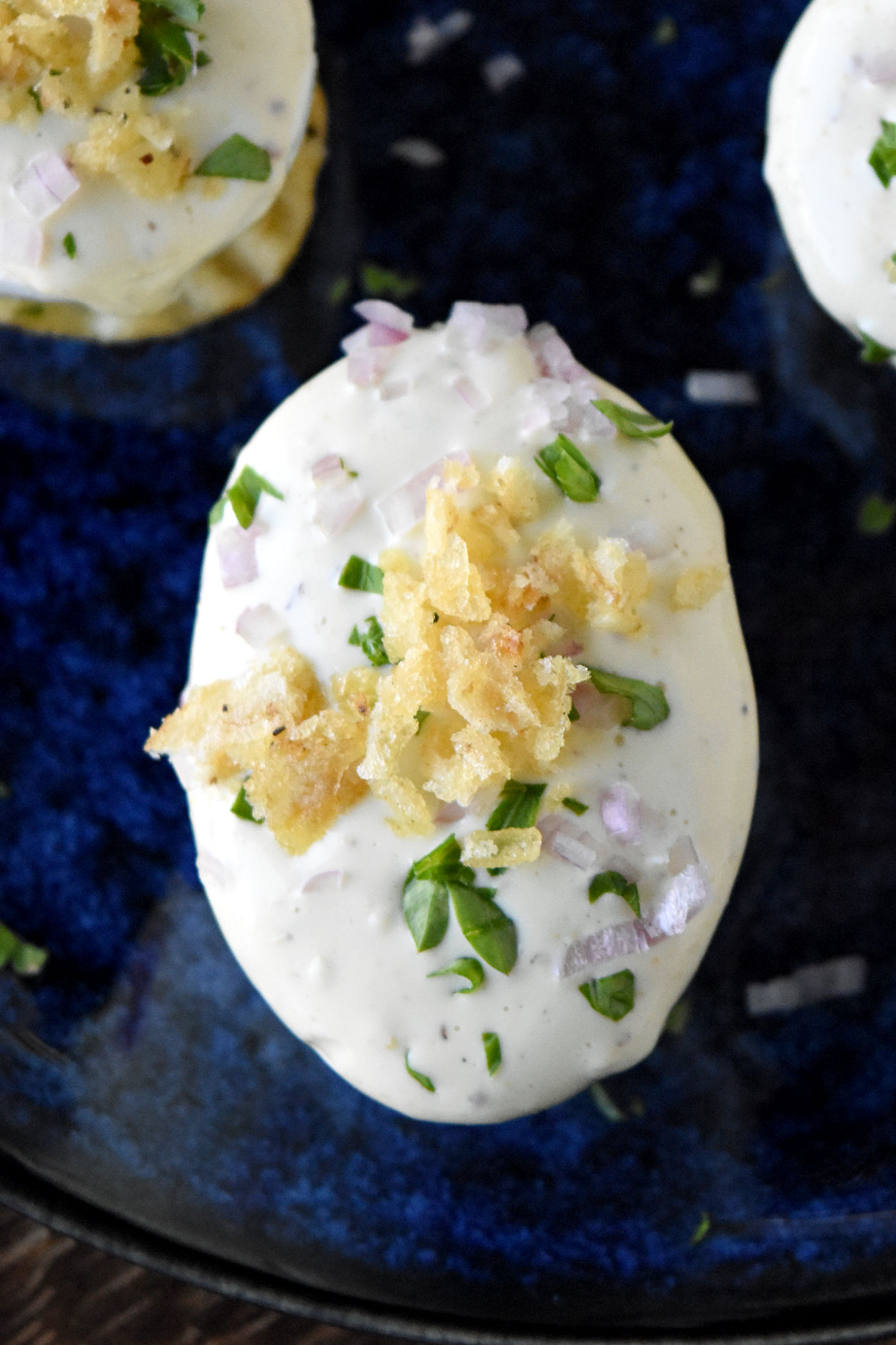 Oeufs Mayonnaise: the perfect balance of rich, creamy mayo and perfectly cooked eggs. A match made in gastronomic heaven.  #FrenchCuisine #ClassicEggDish #FoodieFaves #MayonnaiseObsessed #EggRecipes #OurFamilyTable #JacquesPepin
