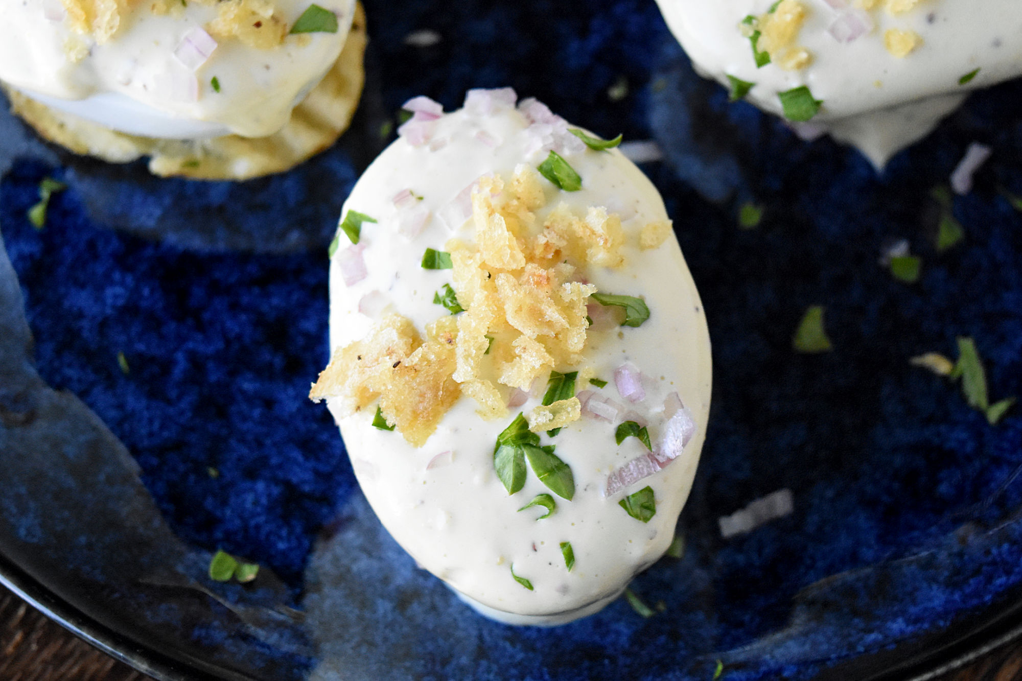 Oeufs Mayonnaise: the perfect balance of rich, creamy mayo and perfectly cooked eggs. A match made in gastronomic heaven.  #FrenchCuisine #ClassicEggDish #FoodieFaves #MayonnaiseObsessed #EggRecipes #OurFamilyTable #JacquesPepin
