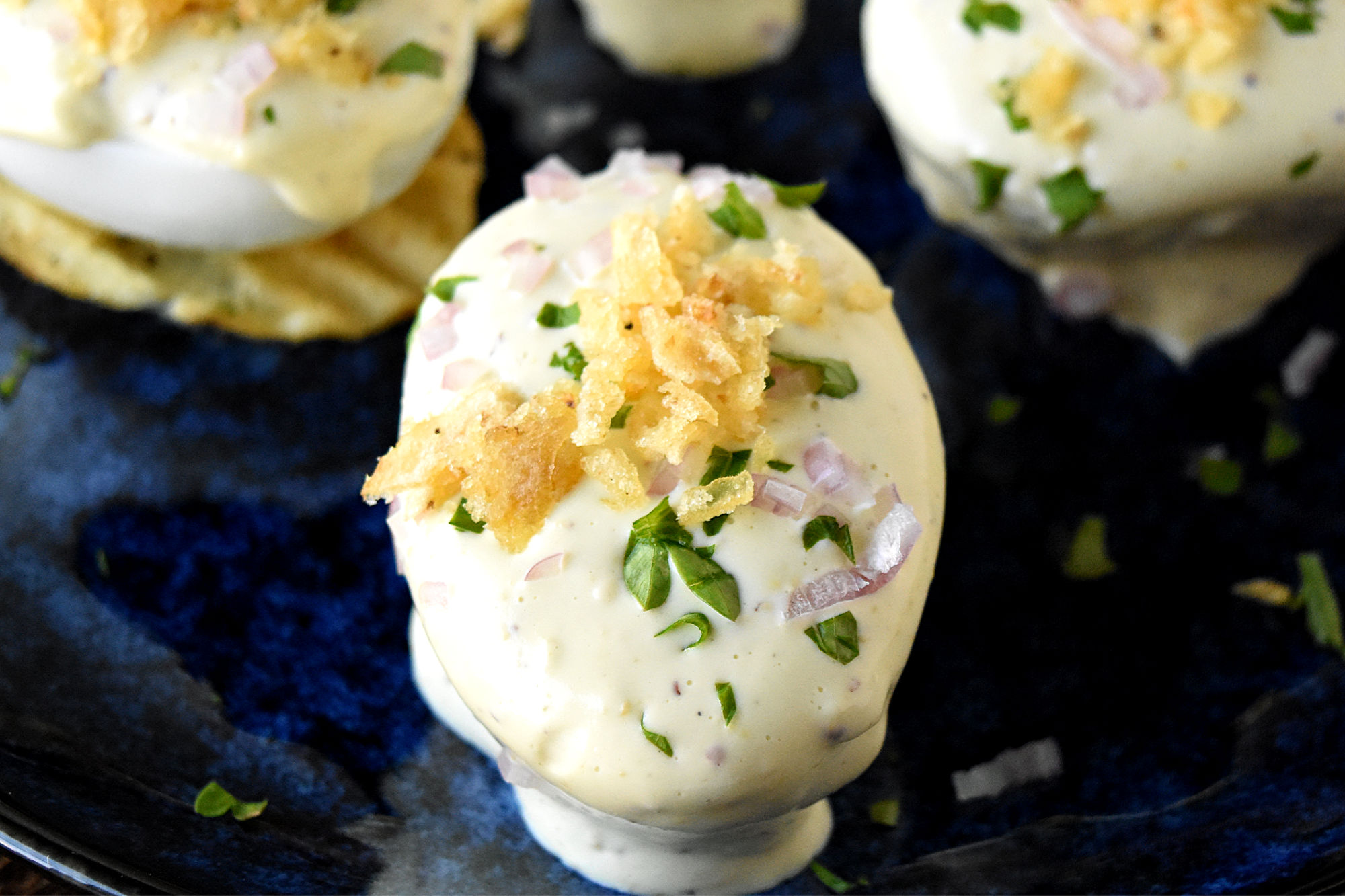 Oeufs Mayonnaise: the perfect balance of rich, creamy mayo and perfectly cooked eggs. A match made in gastronomic heaven.  #FrenchCuisine #ClassicEggDish #FoodieFaves #MayonnaiseObsessed #EggRecipes #OurFamilyTable #JacquesPepin
