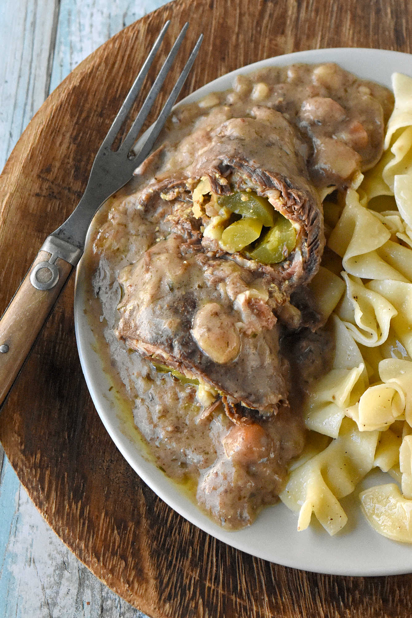 Sink your teeth into a hearty and savory meal with our German Style Beef Rouladen. Perfectly seasoned beef, rolled and simmered in a rich gravy is a hearty crowd-pleasing dinner. #GermanFoodieFriday #BeefRouladen #AuthenticFlavors #MeatLoversUnite #GermanFoodLove #RouladenRecipe #SavorTheFlavors #HomemadeEats #GermanCooking #ComfortFood #GermanDelicacy #RouladenLove #GermanFood #BeefRouladen #Foodie